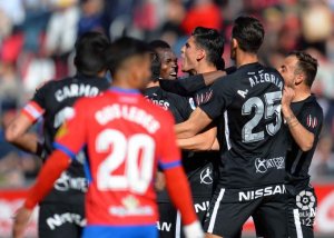 El Sporting le quita la sonrisa al Numancia (1-2)