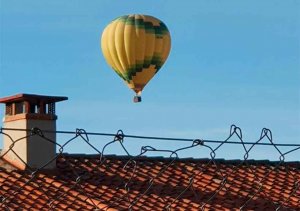 Mujer herida en aterrizaje forzoso de globo aerostático 